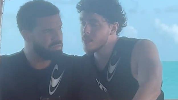 Drake commented under a hilarious post Jack Harlow shared showing himself looking over Drizzy's shoulder while on vacation in Turks and Caicos.