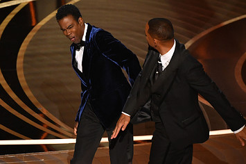 Chris Rock and Will Smith are pictured at the 2022 Oscars