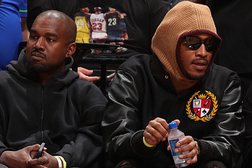 Kanye West and Future attend the game between the Minnesota Timberwolves and the Miami Heat