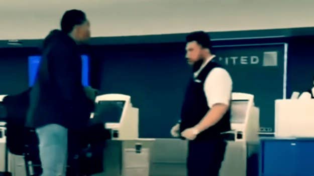 A new video has surfaced showing a one-on-one fight at Newark Airport between an ex-NFL player and a United Airlines employee, who has since been fired.