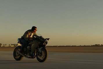 Tom Cruise is seen driving a motorcycle