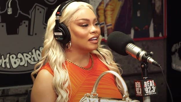The Atlanta rapper told Big Boy she ultimately allowed the unnamed artist to appear on her project: "I was backed into a corner, like, bullied."