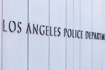 Los Angeles Police Department officers are deployed around the police headquarters