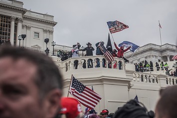 Trump insurrectionists cheer as more of the crowd gains access to the U.S. Capitol