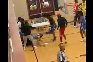 video of referee basketball game attack