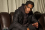 ASAP Rocky is seen holding a glass of his new whisky