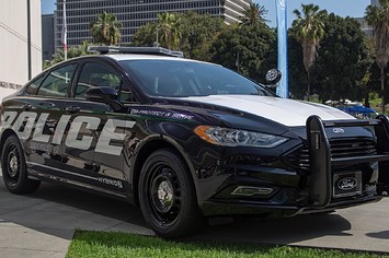 A hybrid police car is seen at the unveiling of two new Ford Fusion hybrid pursuit-rated Police Responder cars