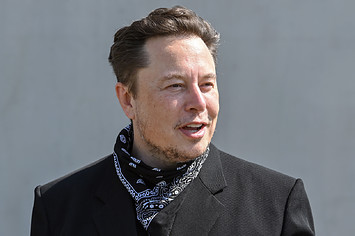 Elon Musk, Tesla CEO, stands at a press event on the grounds of the Tesla Gigafactory