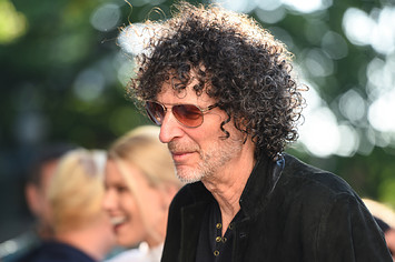 Howard Stern is pictured wearing tinted glasses