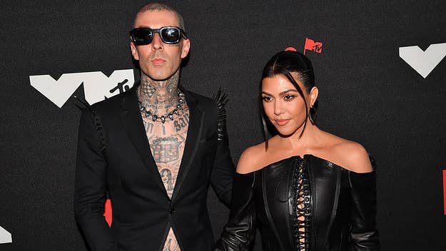 In a new interview with 'Revolver,' Travis Barker addressed the backlash to fiancée Kourtney Kardashian wearing a Cannibal Corpse t-shirt last year.