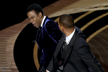Chris Rock and Will Smith are seen onstage during the 94th Annual Academy Awards