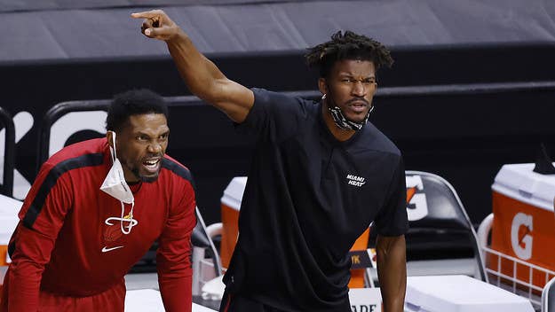 Teammates Udonis Haslem and Jimmy Butler got into a heated argument and had to be separated on Wednesday as the Miami Heat took on the Warriors.