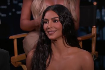 Kim Kardashian is pictured speaking with Jimmy Kimmel