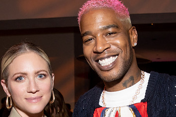 Brittany Snow and Kid Cudi take a photo together at a screening event.