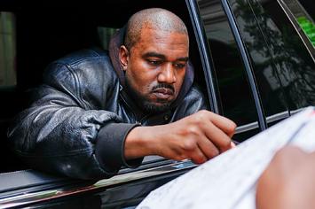 Kanye West signs autographs in 2022
