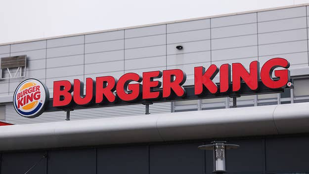 A South Florida woman accused of shooting at a customer in the drive-thru area of the Burger King location where she worked was arrested and charged.
