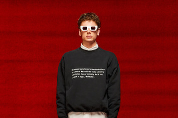 A person displaying a look from Mr. Saturday's Fall/Winter 2022 collection.