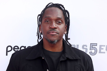 Pusha T is pictured on a red carpet