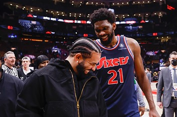 Joel Embiid of the Philadelphia 76ers greets Canadian rapper Drake