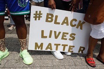 Supporters of Casey Goodson Jr. hold a # Black Lives Matter sign