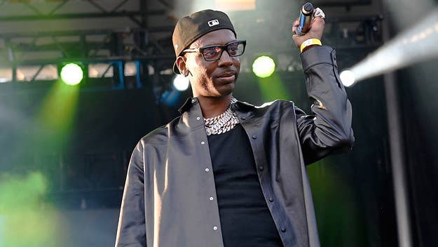 One of the suspects charged with killing Young Dolph was sentenced Tuesday to two years in prison for violating his supervised release on a previous charge.