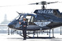 Tom Cruise is seen exiting a helicopter