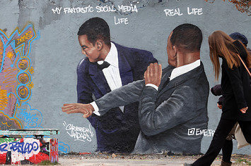 Photograph of Will Smith Chris Rock meme mural
