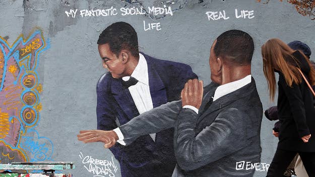 An artist in Berlin, Germany has painted a mural of Will Smith slapping Chris Rock at the Oscars, but turned it into an "expectation vs. reality" meme.