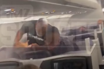 Mike Tyson doing airplane punches