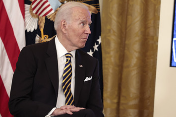 Joe Biden sitting in striped tie