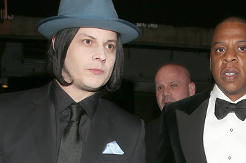 Jack White and Jay Z are pictured wearing suits