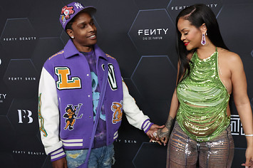 ASAP Rock and Rihanna are pictured at a Fenty event