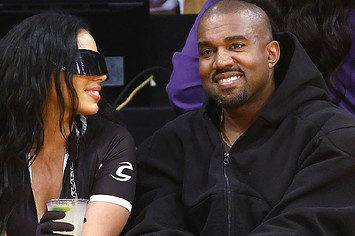 Kanye West and Chaney Jones attend a game between the Washington Wizards and Los Angeles Lakers