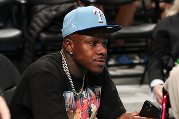 DaBaby attends a game between the Denver Nuggets and Charlotte Hornets