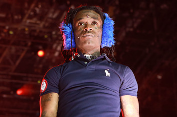 Lil Uzi Vert is seen wearing headphones