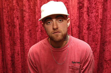 Mac Miller is pictured posing for the camera