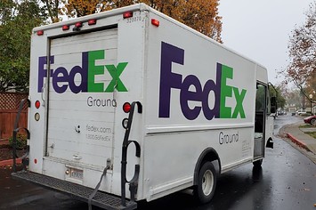 Photograph of a Fedex truck driving