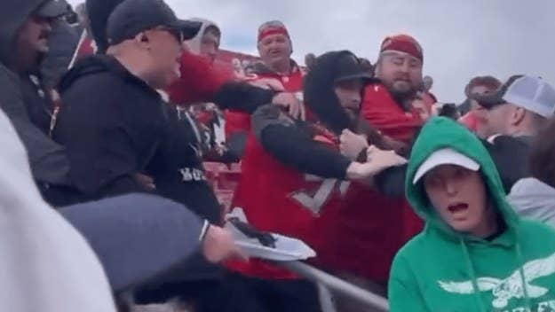 In several videos shot during the playoff game, recorded around when Philadelphia was down 31-0, two Eagles fans can be seen seemingly initiating a fight.