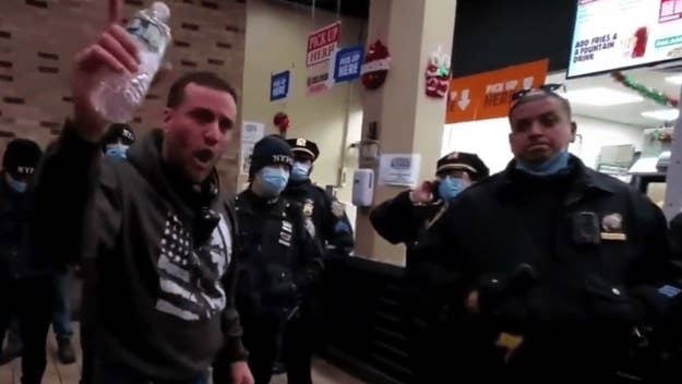 Five anti-vax protesters were arrested by NYPD officers after they stormed a Burger King in Downtown Brooklyn and refused to leave or show proof of vaccination.