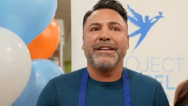 The former boxer, who is ringing in his 49th year, spent his big day preparing meals with girlfriend Holly Sonders at Project Angel Food in Los Angeles.