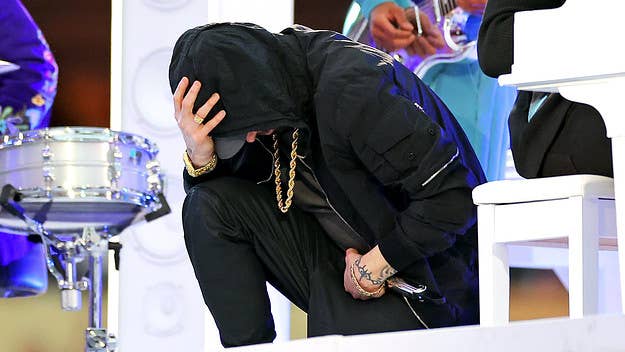 Eminem took a knee on Sunday during the Pepsi Super Bowl LVI Halftime Show at SoFi Stadium, which also saw performances from Dr. Dre, Kendrick, Snoop, and more.