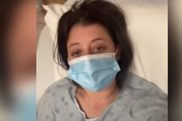 A woman is pictured in the hospital