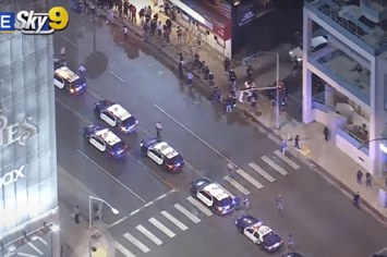 Police arrive outside of the Roxy in Los Angeles