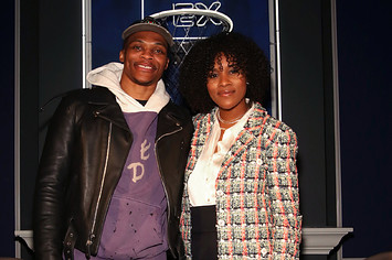 Russell and Nina Westbrook pose for a photo together.