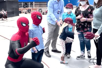 Tom Holland hangs out with young fan on 'No Way Home' set