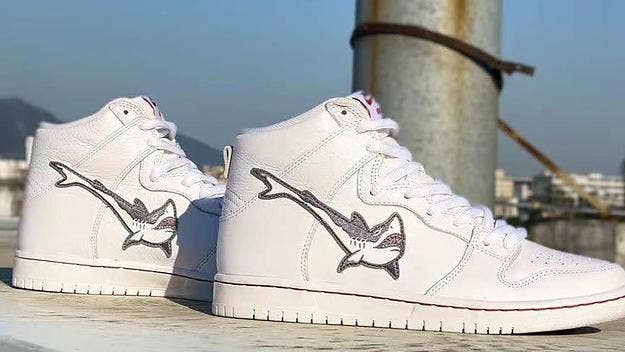 Oskar 'Oski' Rozenberg has another shark-themed Nike SB Dunk High dropping in March 2022 along with apparel. Find details on the collaboration here.
