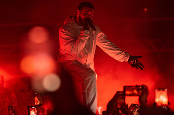 Drake is seen performing music for fans