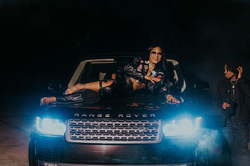 Scarborough rapper Tia Banks poses on Range Rover