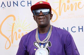 Flavor Flav at a red carpet event.