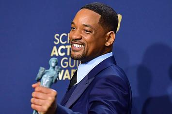 US actor Will Smith poses in the press room with his award for Outstanding Performance by a Male Actor.